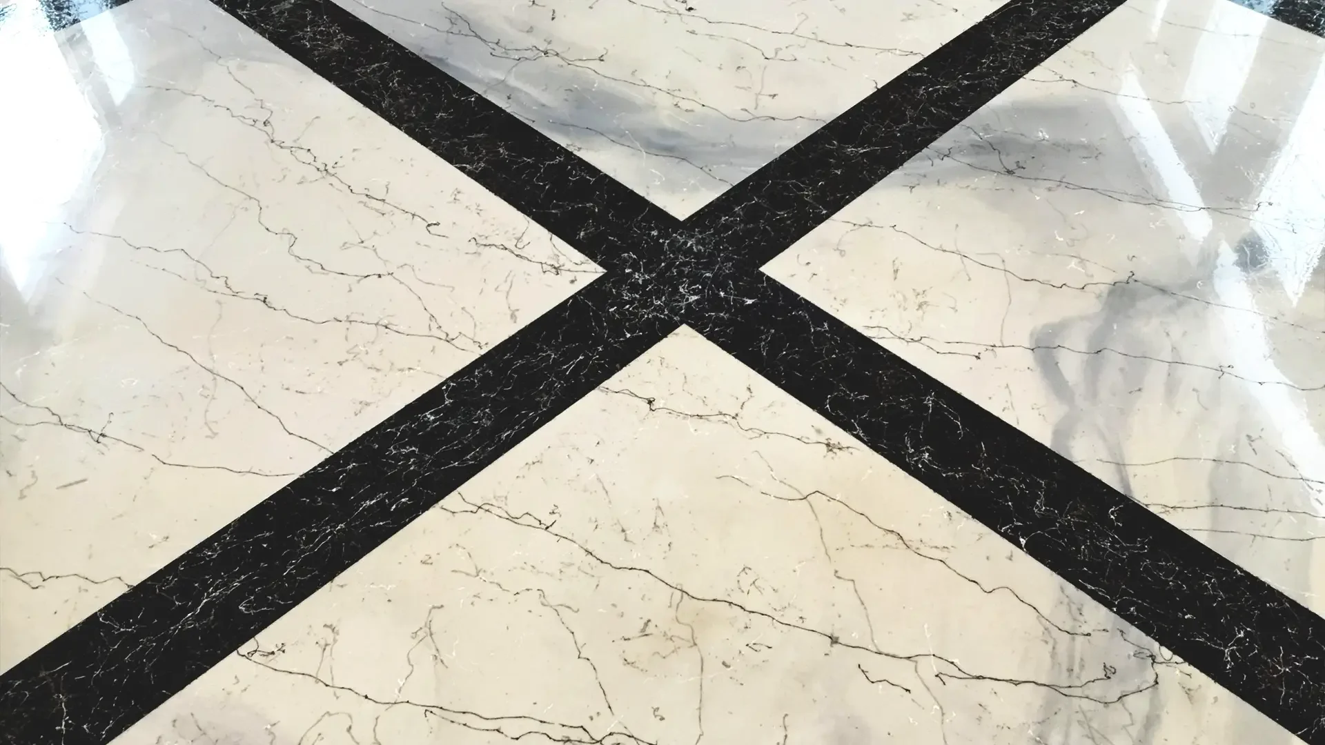 Italian Marble epoxy flooring with black veining detail installed by TVS Coatings in Idaho