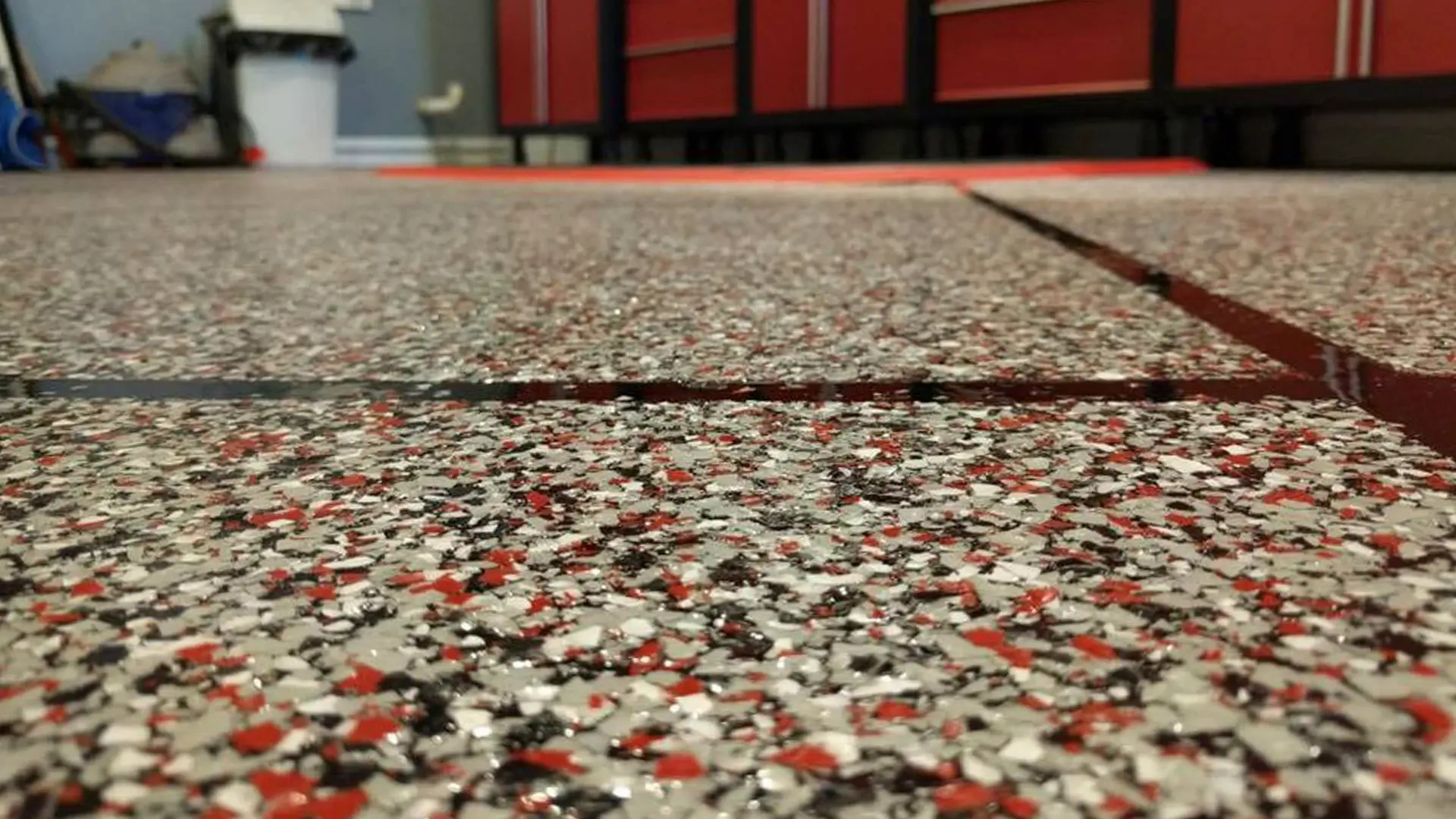 red flake epoxy flooring in a residential garage in Idaho