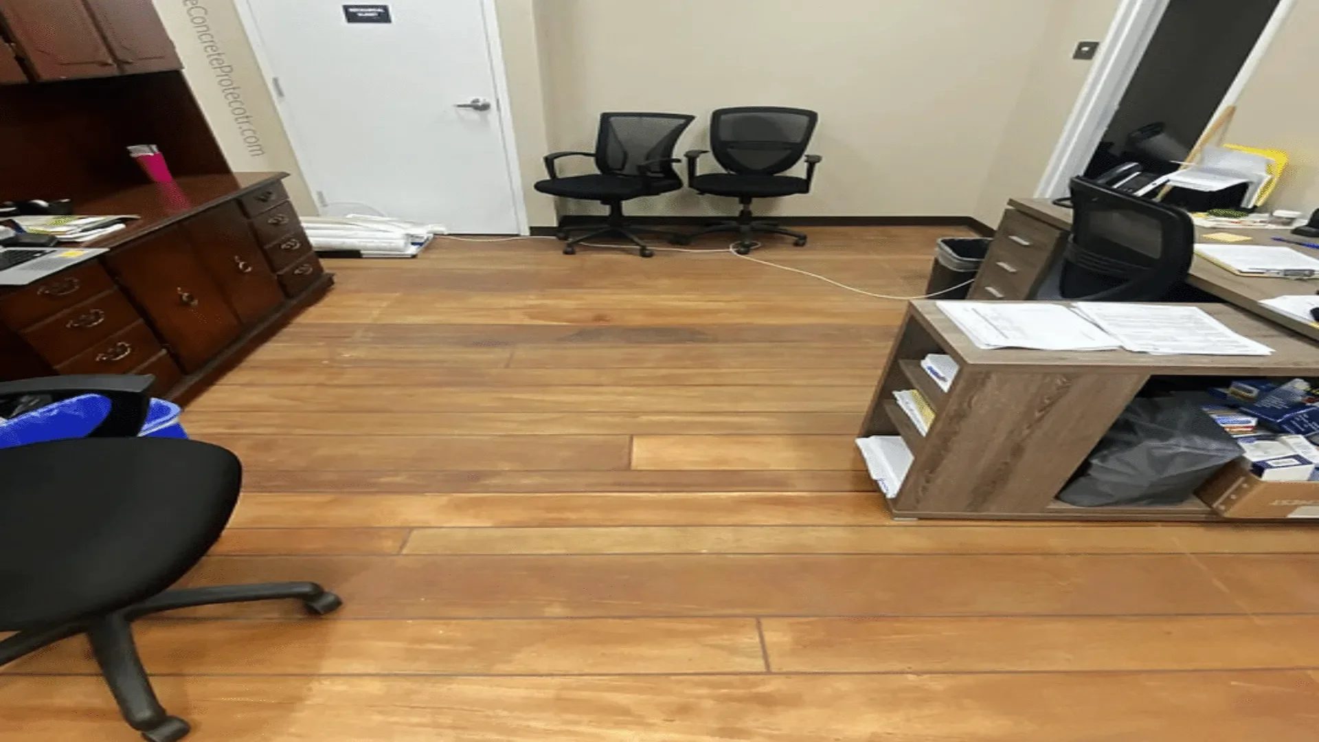 Rustic Concrete Wood epoxy flooring system installed in an Idaho office by TVS Coatings, featuring a warm wood grain finish