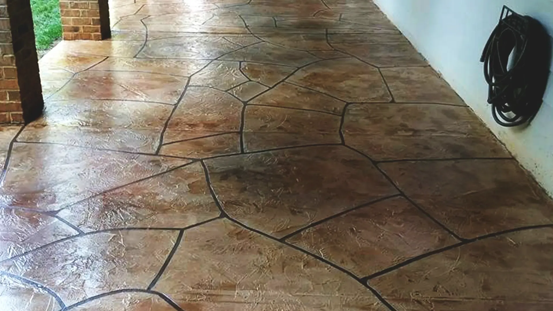 Grand Flagstone style residential patio with epoxy flooring in Idaho