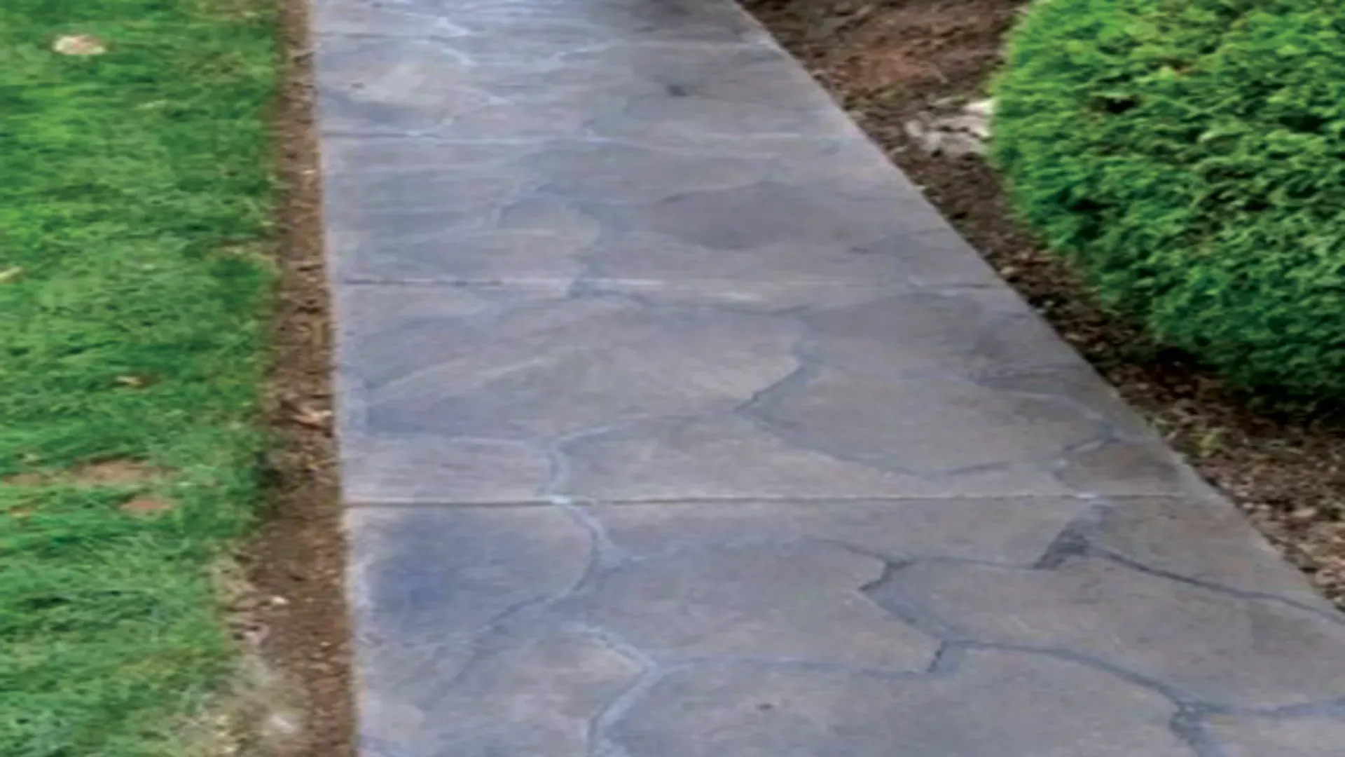 Decorative concrete sidewalk with grand flagstone texture in Idaho