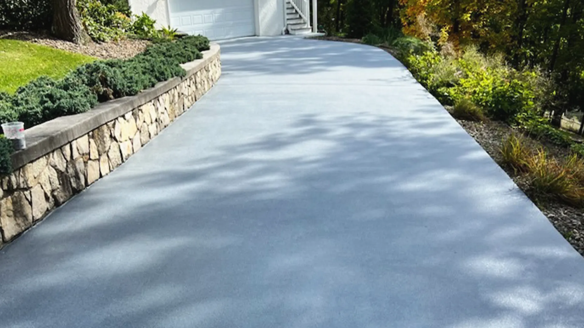 Graniflex decorative concrete driveway with a durable, slip-resistant finish that enhances curb appeal and withstands daily use.